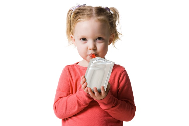 Girl drinking from pouch